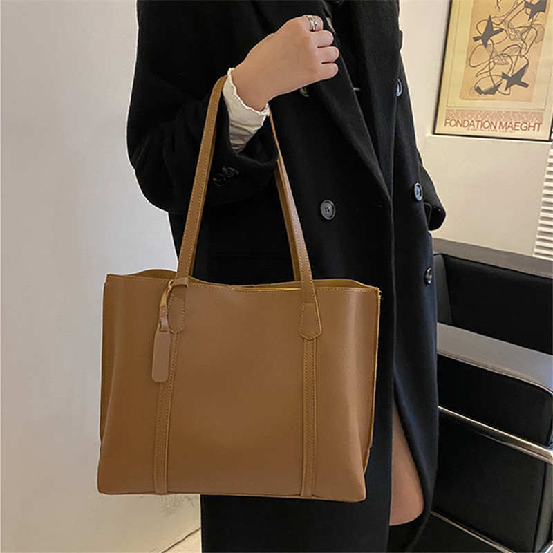 Klassieke zwarte handtas van k - Leatherworking Classic recensie en prijs