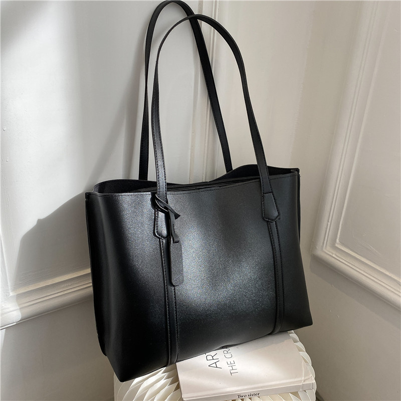 Klassieke zwarte handtas van k - Leatherworking Classic recensie en prijs