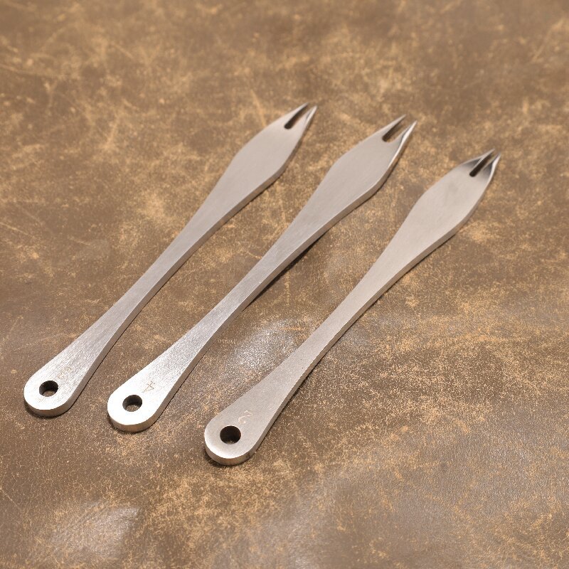 Verstelbare lederen vleugelver - Wing Divider Stitch recensie en prijs