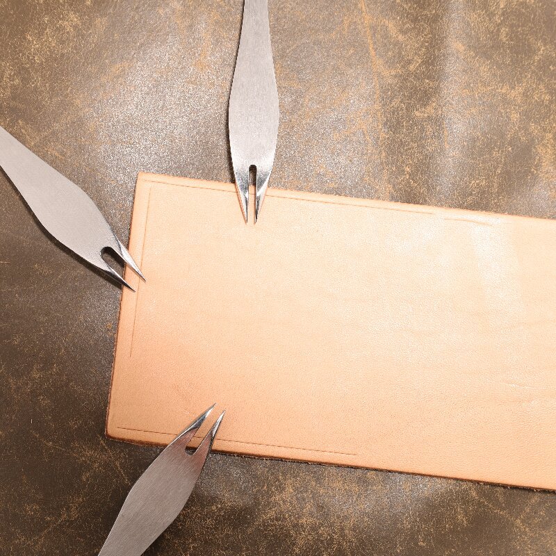 Verstelbare lederen vleugelver - Wing Divider Stitch recensie en prijs